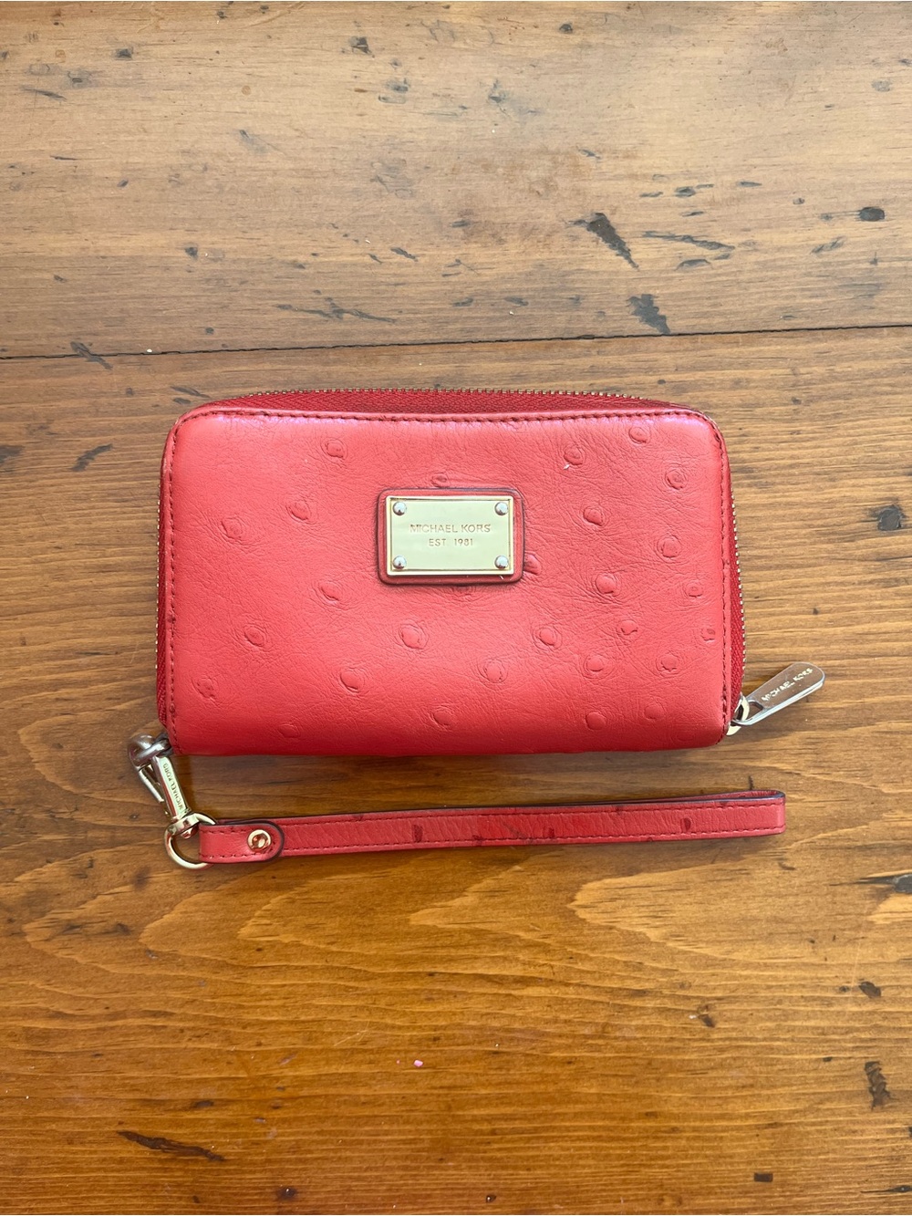 Michael Kors Coral-Red Leather Wristlet with Gold Plaque